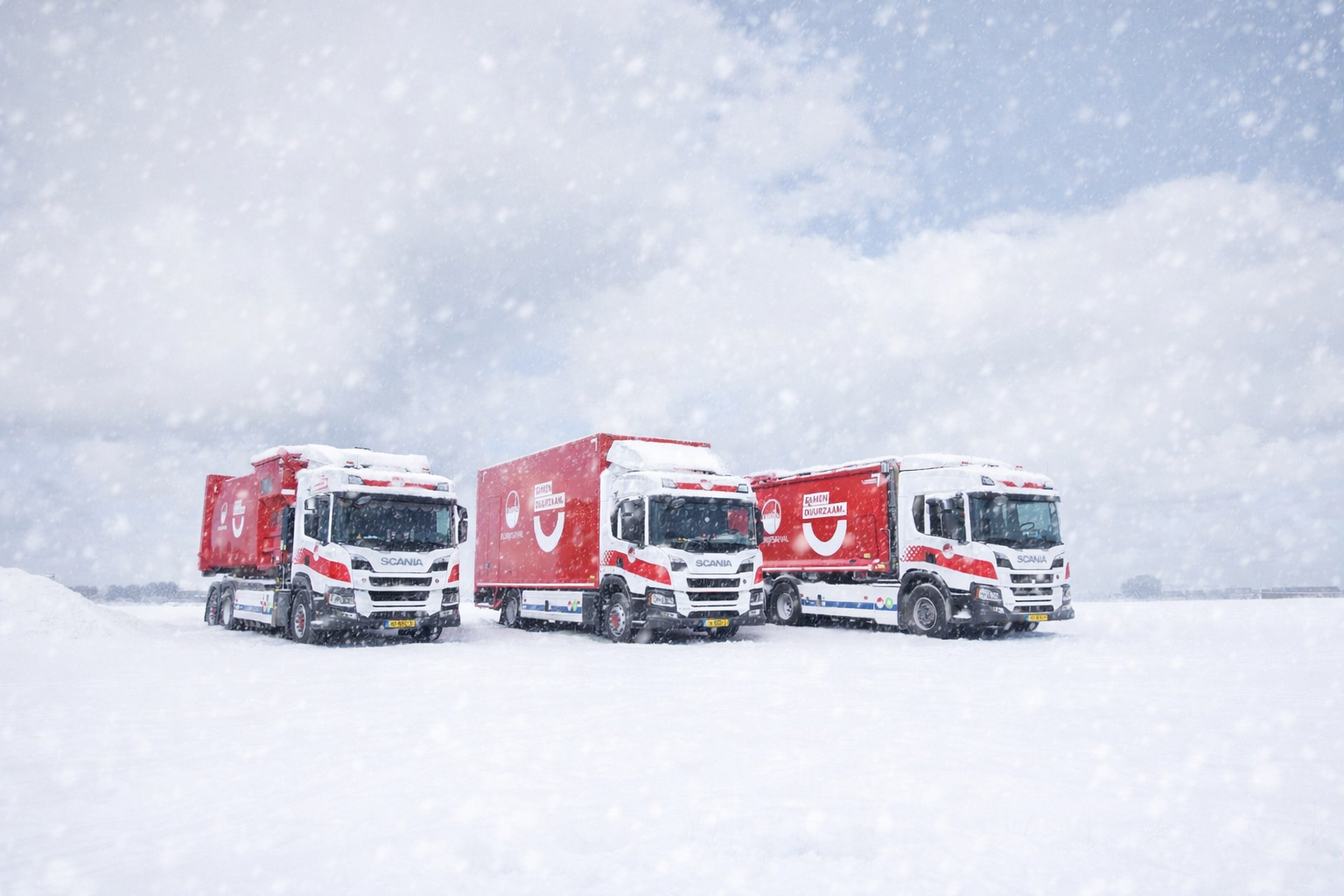 Wagens Omrin Bedrijfsafval in sneeuw